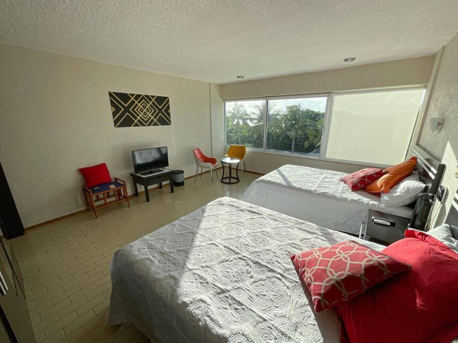 Neat Beachfront At Brisas Apartment *