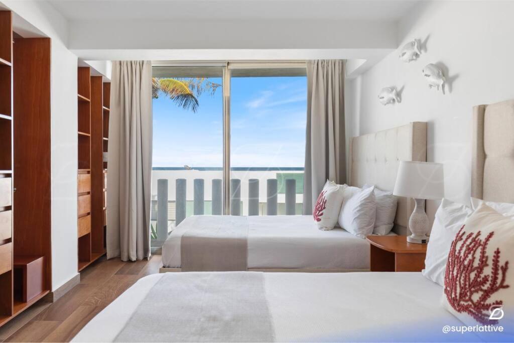 Apartment Deluxe Beachfront 4b *